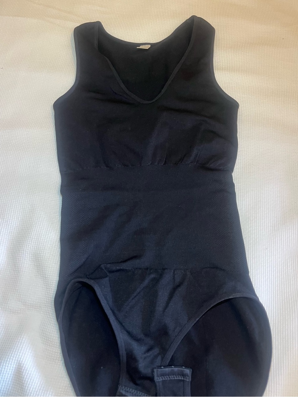 Black Sleeveless One-Piece Bodysuit